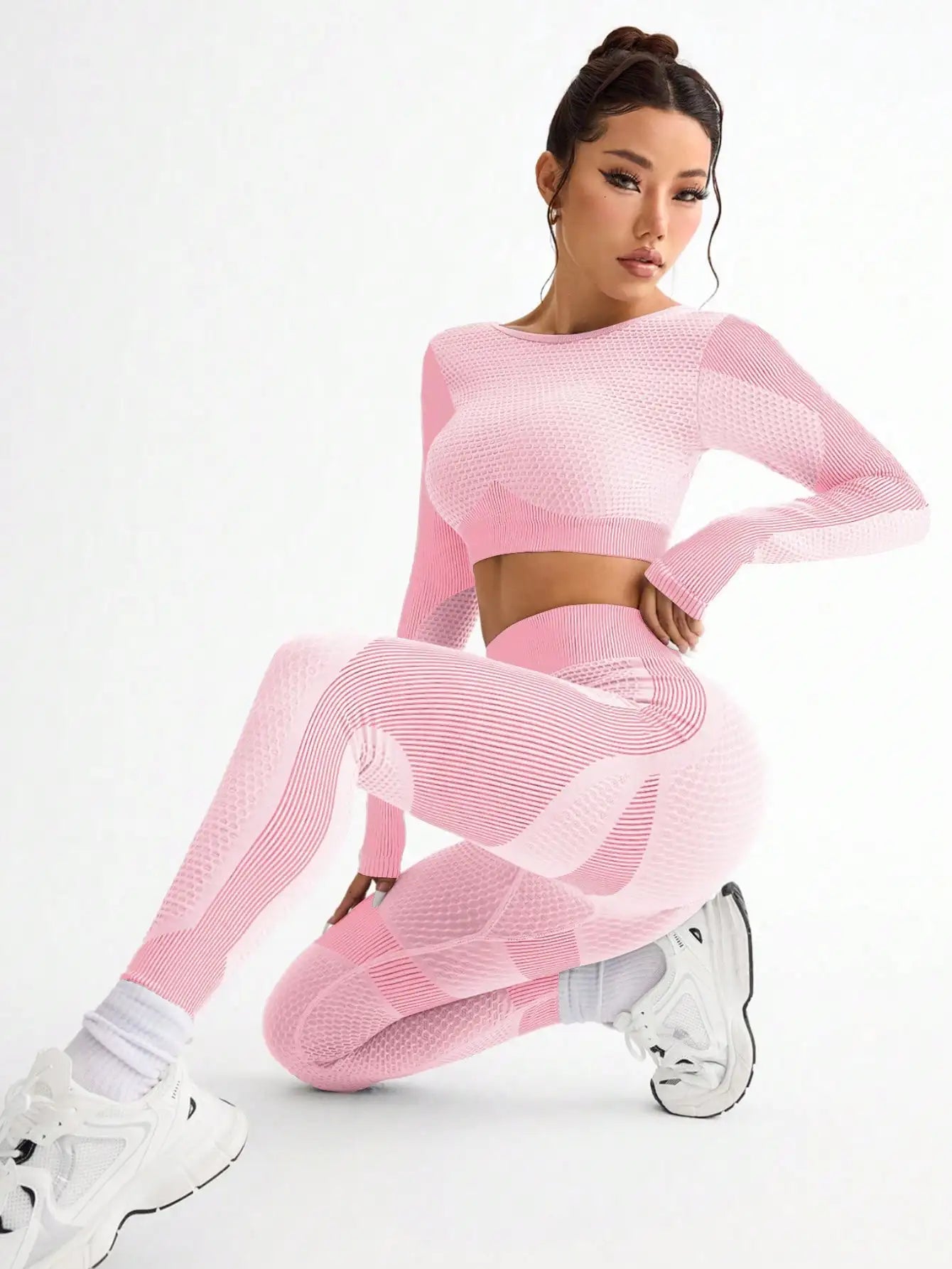 2pcs Hot-selling New Sports set featuring a woman in stylish pink workout attire, perfect for fitness enthusiasts.